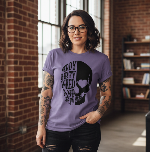 Woman wearing a purple t-shirt with a skull design and text, standing in a room with brick walls and bookshelves.