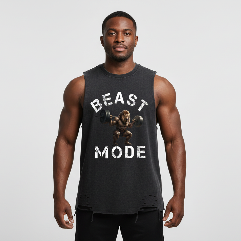 Man wearing a black sleeveless shirt with 'Beast Mode' graphic on a light gray background